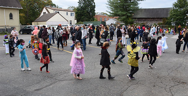 Students Dressed Up in Costumes During Parade