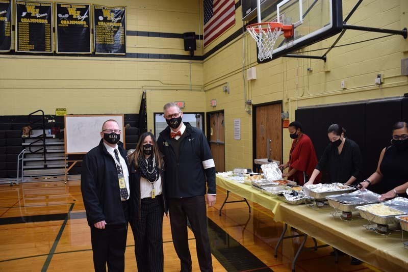 Students and Staff At Thanksgiving Feast