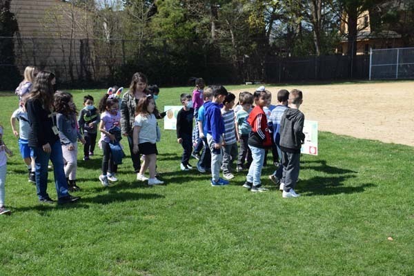 Kindergartners at Chestnut Street School in West Hempstead enjoyed an interactive storybook adventure with a StoryWalk during National Library Week. 