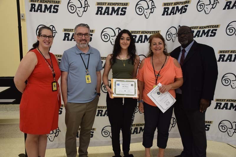 Honoree with staff