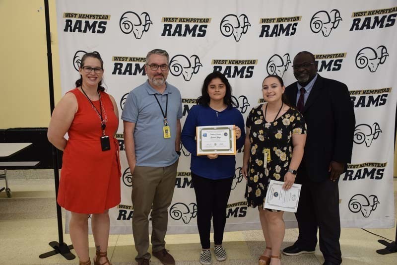 Honoree with staff