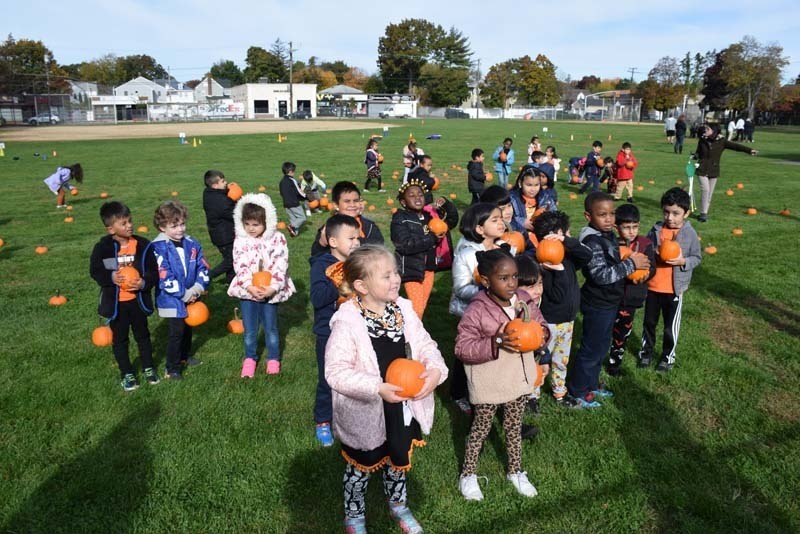 Students Picking Pumpkins