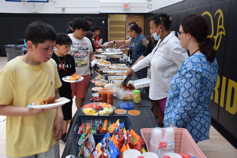 English as a New Language students in the West Hempstead School District gathered for an international luncheon on June 2 to celebrate the progress and achievements they made during the school year.   The event brought together both middle and high school ENL students in the secondary school’s gymnasium, who were tasked with bringing in native dishes to create a buffet. The varied cuisine featured traditional foods from several geographic regions, including El Salvador, Honduras, South America and several Caribbean countries.   Along with enjoying a variety of ethnic foods, some students engaged with teachers and staff to discuss their accomplishments.      Photo caption: 1-7: English as a New Language students in the West Hempstead School District gathered for an international luncheon on June 2 to celebrate the progress and achievements they made during the school year. 